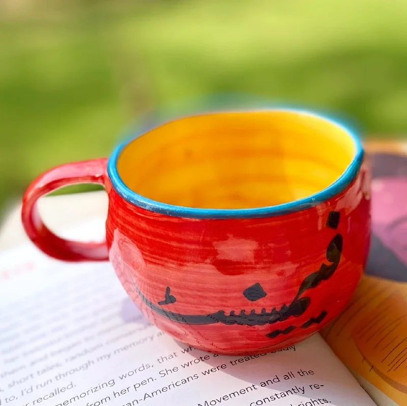 Holiday-themed ceramic mug-Feminist wobbly mug in red. These mugs are hand built so each mug will be different in its crookedness and wobbliness. No two are the same.