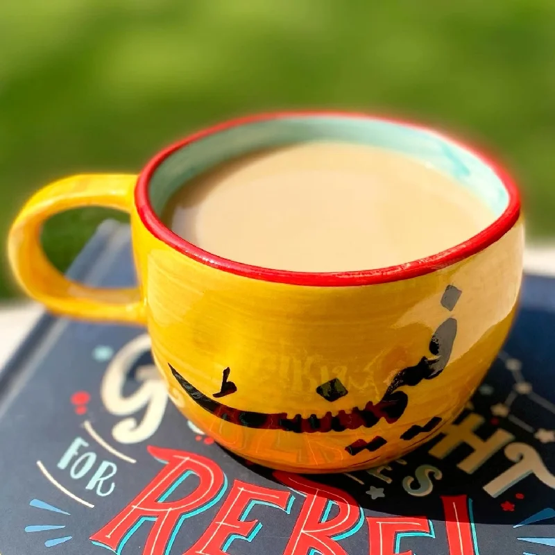 Dishwasher-safe coffee mug-Feminist wobbly mug in yellow. These mugs are hand built so each mug will be different in its crookedness and wobbliness. No two are the same.